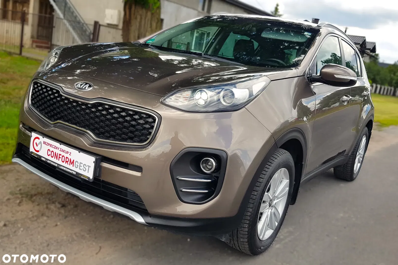 Kia Sportage — photo 1 of 19