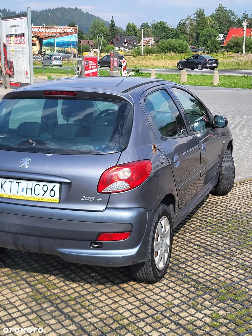 2010 Peugeot 206 plus 1.1 Presence, photograph 11