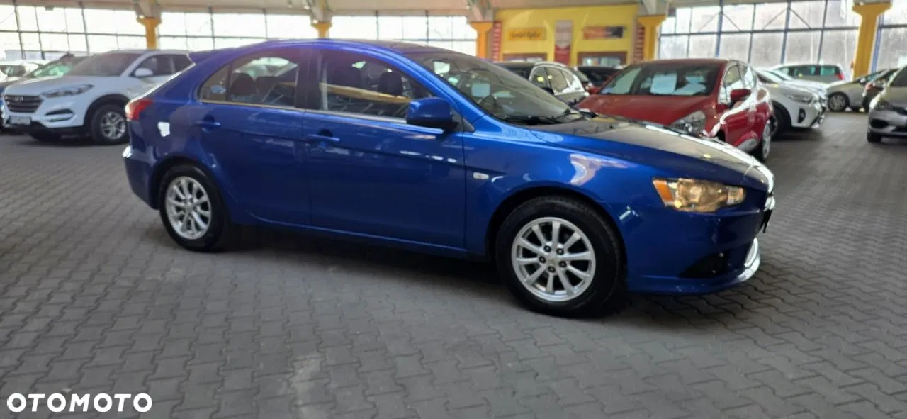 Mitsubishi Lancer — photo 1 of 23