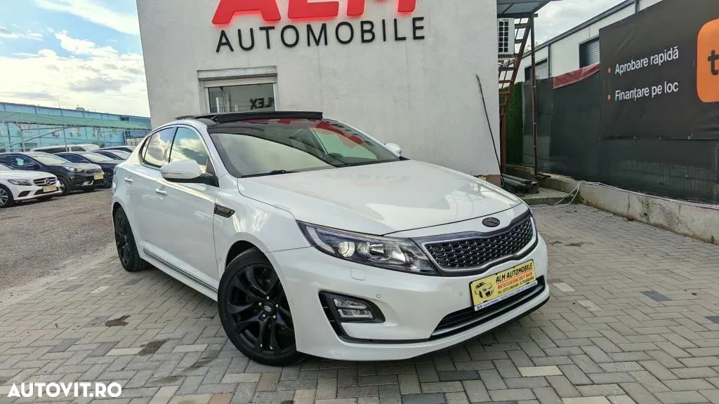 Kia Optima 2.0 CVVT Spirit — photo 1 of 33