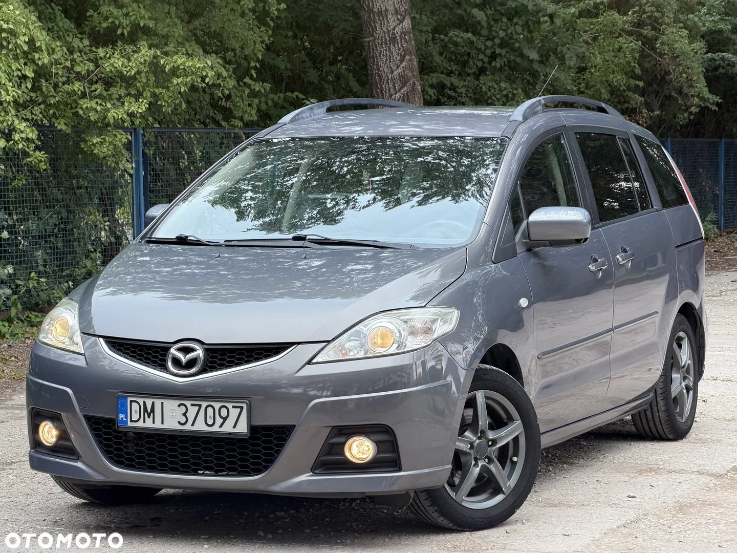 Mazda 5 1.8 Exclusive + — photo 1 of 12
