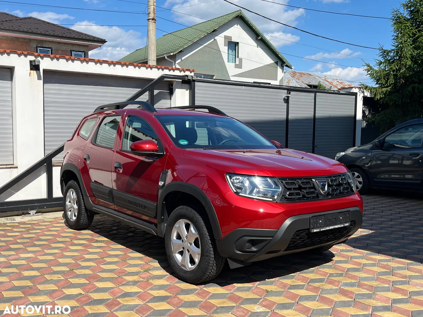 Dacia Duster TCe 100 Comfort — photo 1 of 18
