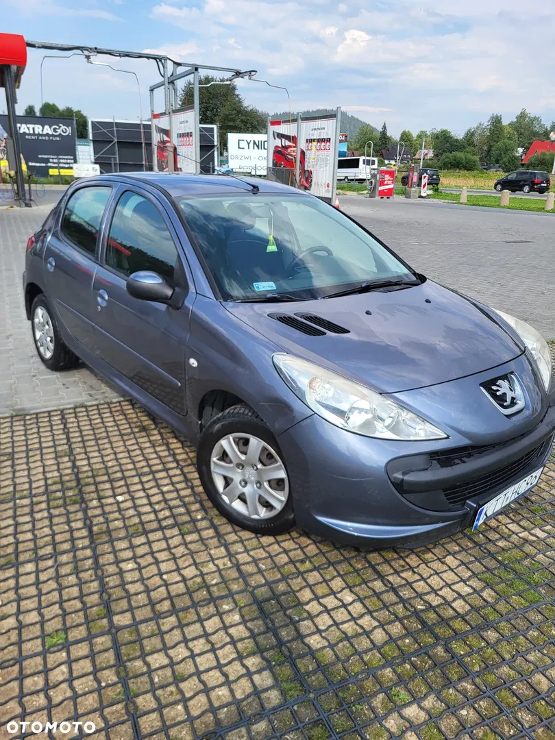 2010 Peugeot 206 plus 1.1 Presence, photograph 1