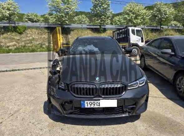 2023 BMW 320i Touring, photograph 1