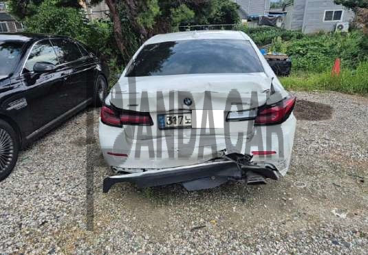 2021 BMW 523d xDrive, photograph 1