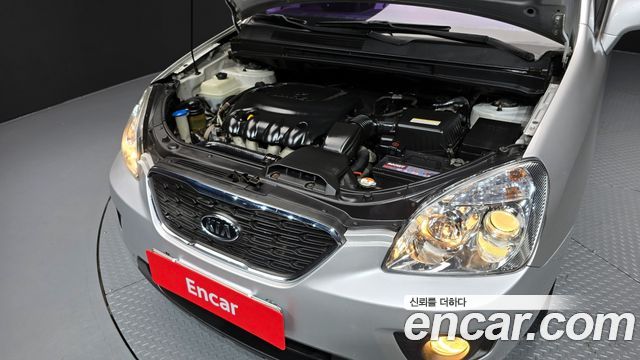 Kia Carens LPI 2.0 GLX — photo 1 of 20