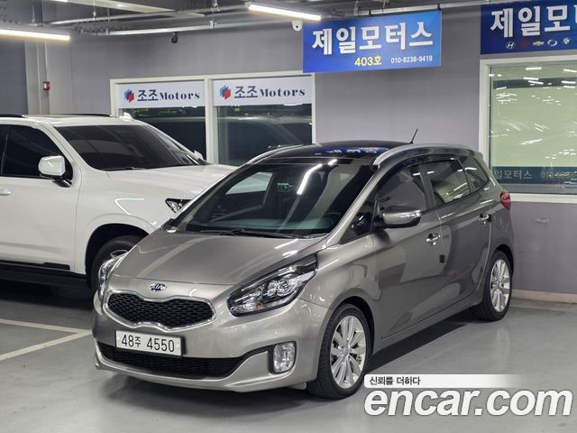 Kia Carens 1.7 VGT Prestige — photo 1 of 20