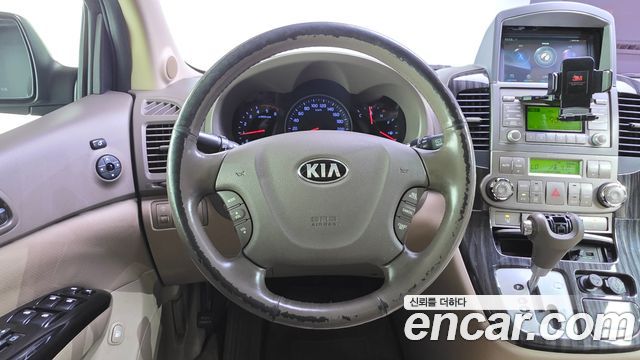 Kia Canival Grand Carnival GLX — photo 1 of 20
