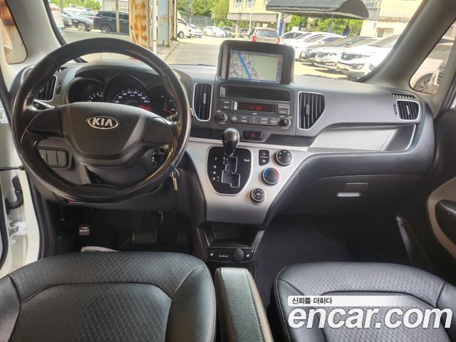 Kia RAY Deluxe — photo 1 of 19