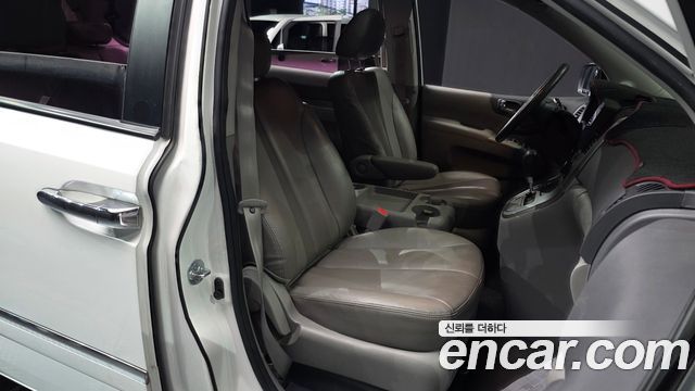 Kia Canival Grand Carnival GLX — photo 1 of 20