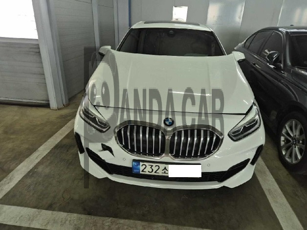 BMW 118d — photo 1 of 4