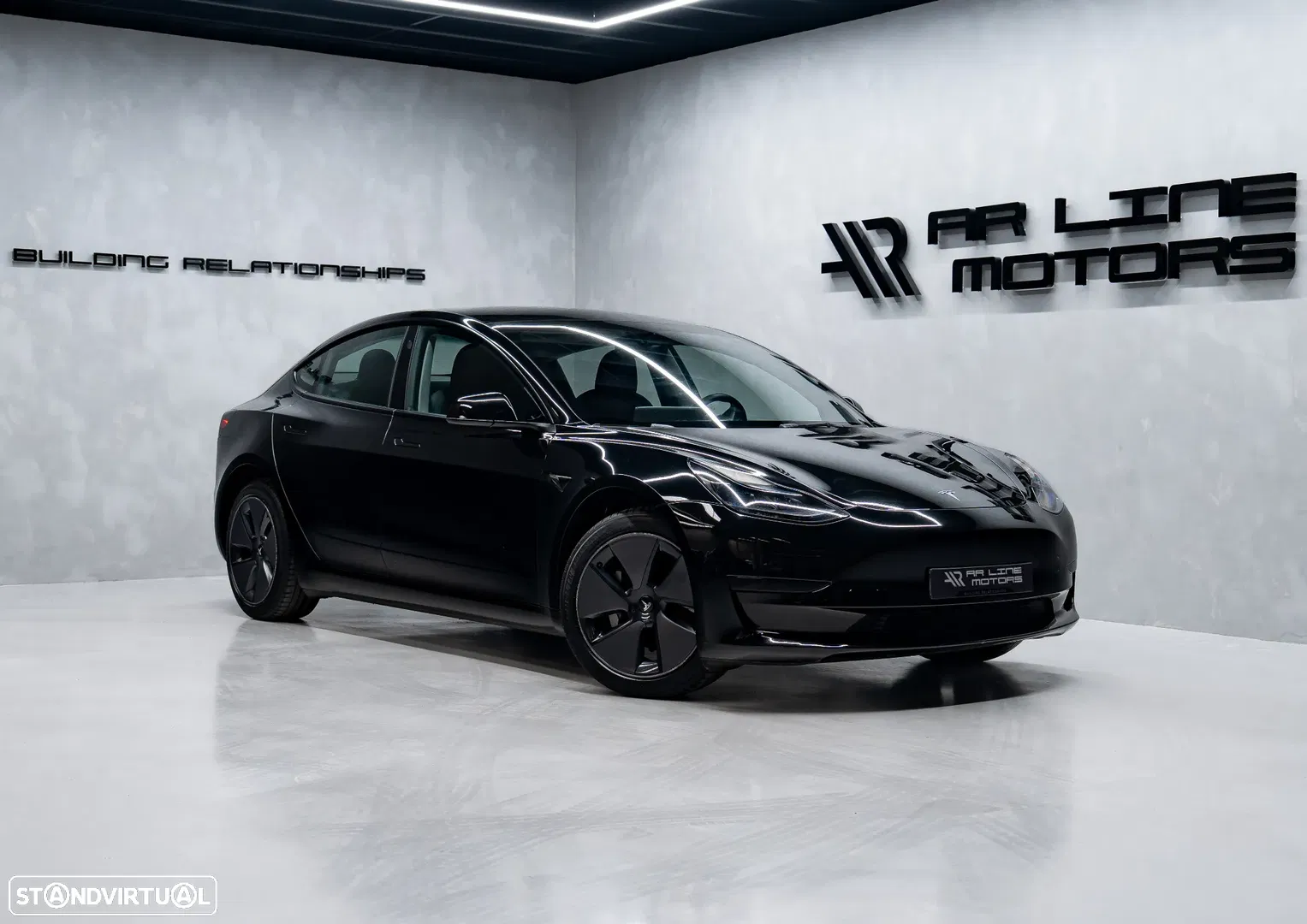 2023 Tesla Model 3 Standard Range Plus RWD, photograph 1