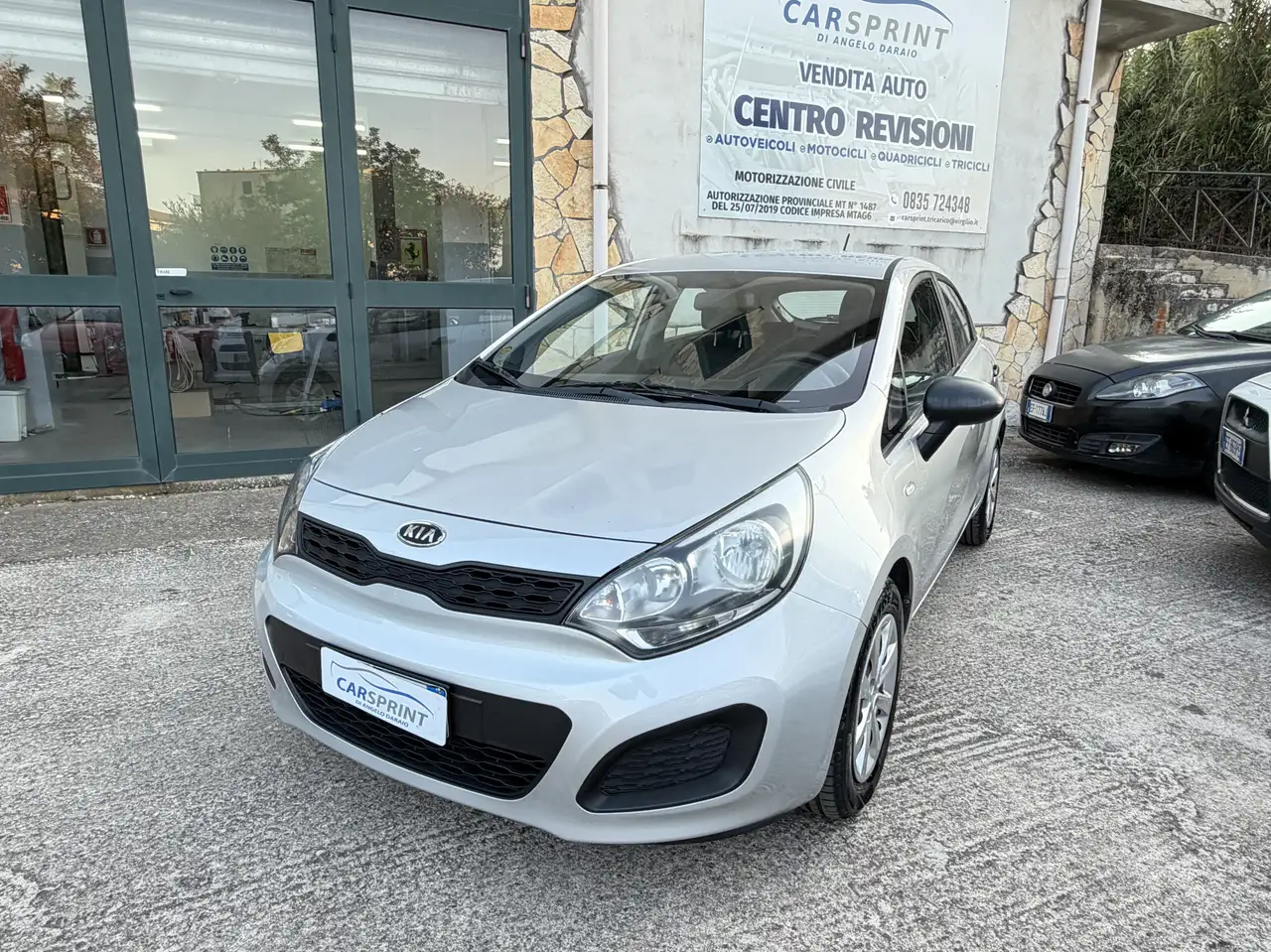 Kia Rio 5p 1.2 EX — photo 1 of 15