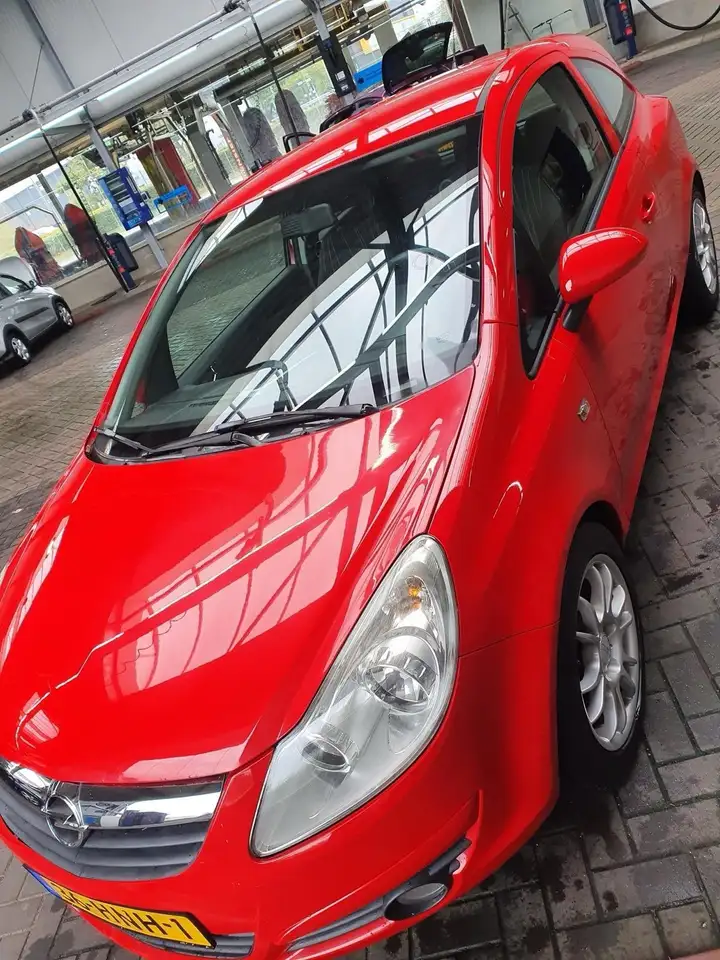 Opel Corsa 1.4-16V Business — photo 1 of 8