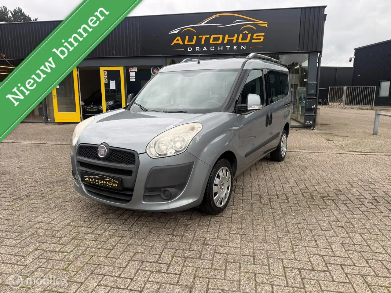 Fiat Doblo 1.4 Emotion 7p. AIRCO EL RAMEN TREKHAAK 120817 KM — photo 1 of 16
