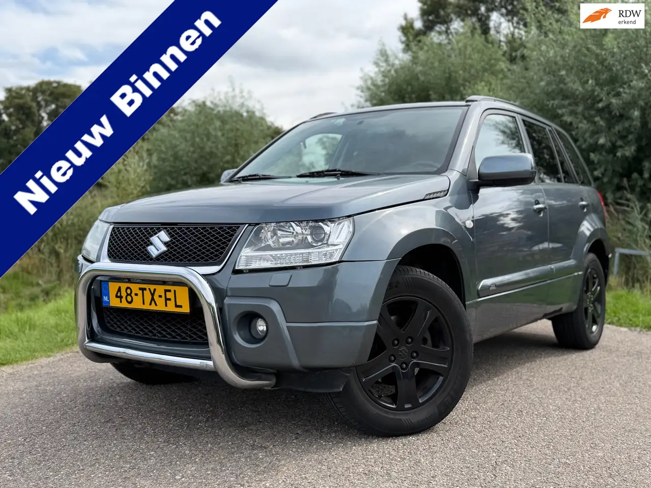 Suzuki Grand Vitara 2.0-16V High Executive Automaat / Schuif-/Kantelda — photo 1 of 26