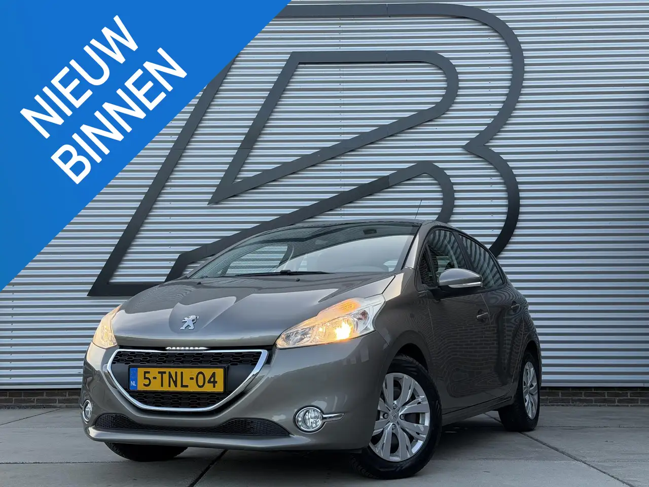 Peugeot 208 1.2 e-VTi Envy 1e Eigenaar|Navi|Clima|Cruise|PDC|D — photo 1 of 36