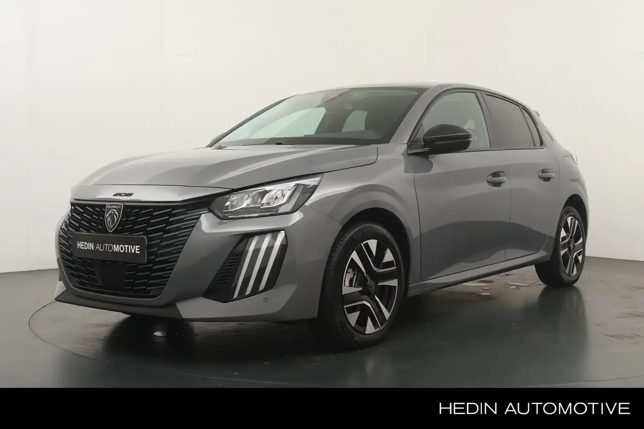 Peugeot 208 1.2 110pk Hybrid e-DCS6 Allure Automaat | Parkeers — photo 1 of 40