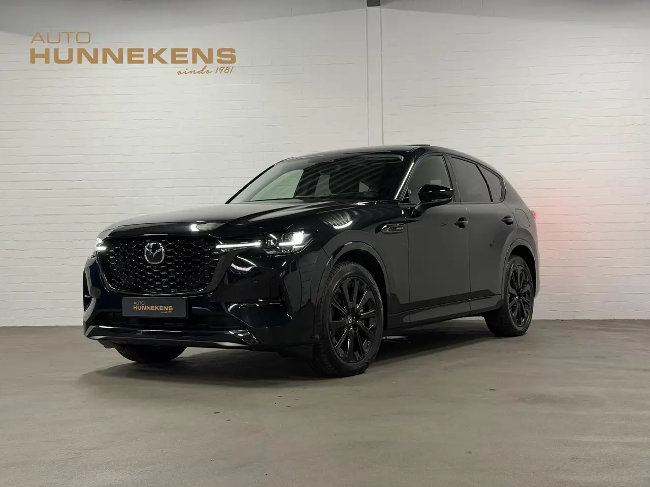 Mazda CX-60 2.5 e-SkyActiv PHEV Homura Open dak | Adapt. cruis — photo 1 of 40