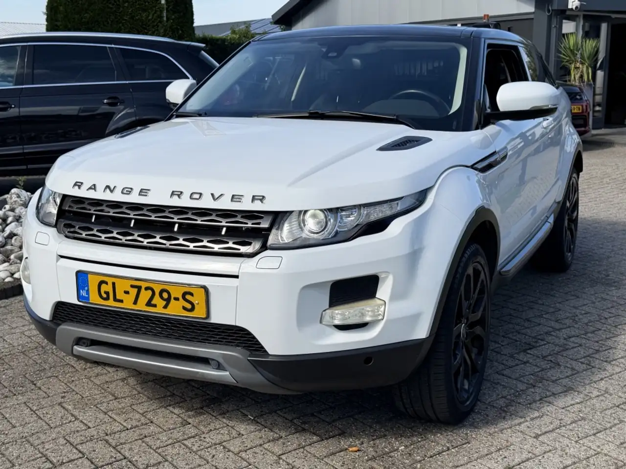 Land Rover Range Rover Evoque Coupé 2.0 SI Benzine 4WD Prestige Automaat Wit / Z — photo 1 of 14