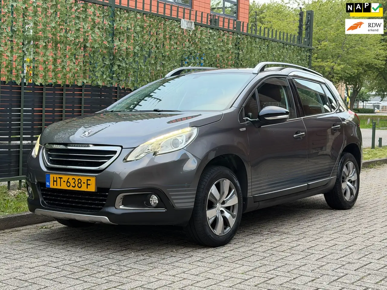 Peugeot 2008 1.2 PureTech Urban Cross 2016 TREKHAAK|LED|NAP — photo 1 of 26
