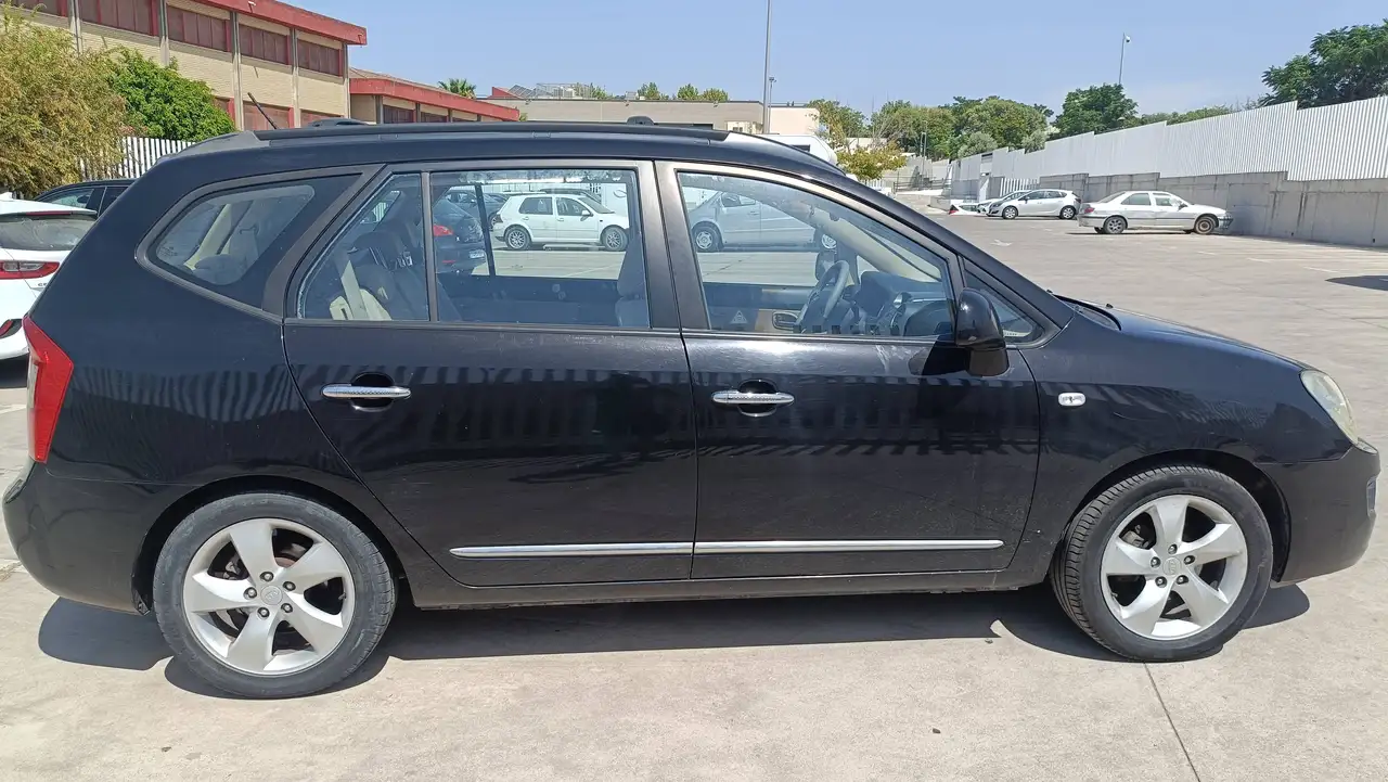 Kia Carens Carens 2.0CRDI Emotion Emotion — photo 1 of 11