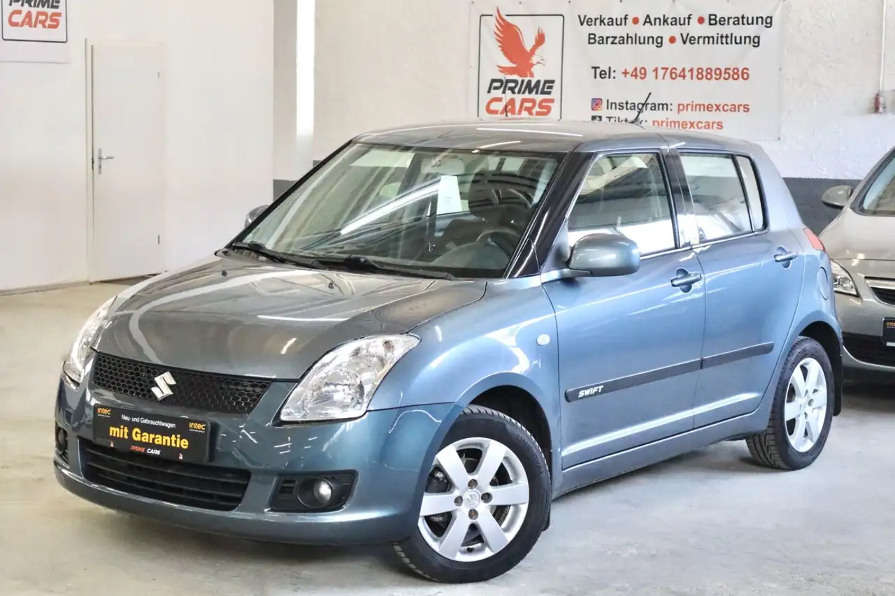 Suzuki Swift Lim. Comfort*4x4*TÜV*AHK* — photo 1 of 31