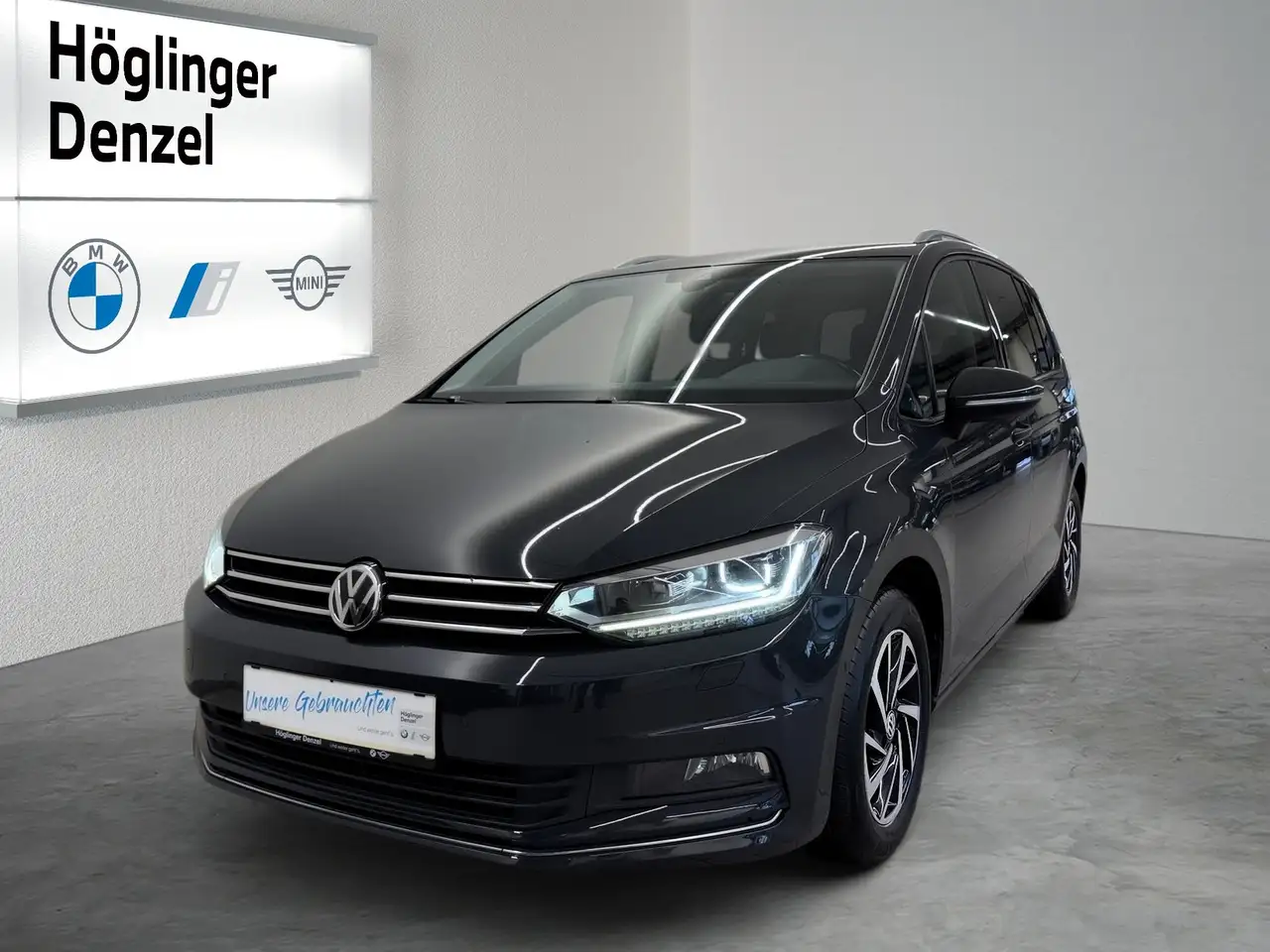 Volkswagen Touran Comfortline 2,0 BMT TDI DSG — photo 1 of 12