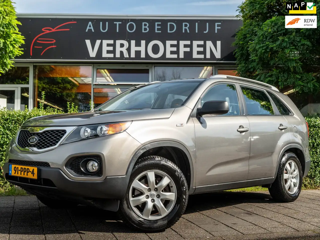 Kia Sorento 2.4 X-tra | NAVIGATIE | TREKHAAK | AIRCO | XENON | — photo 1 of 27