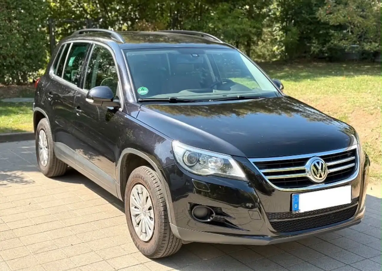 Volkswagen Tiguan 1.4 TSI 4Motion Sport & Style — photo 1 of 14