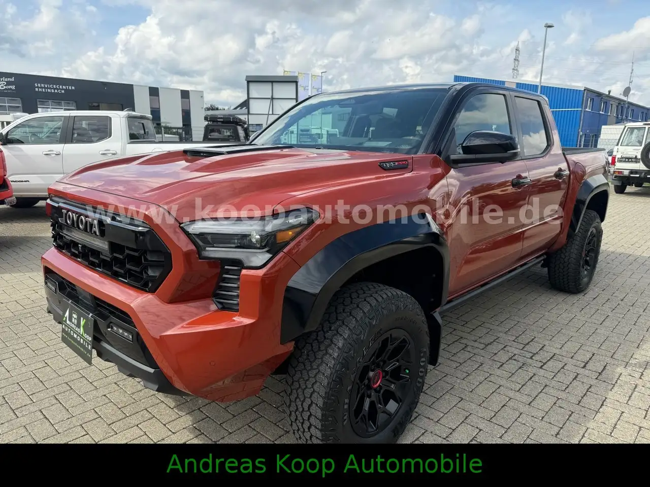 Toyota Tacoma TACOMA DC 326PS TRD PRO HYBRID STOCK — photo 1 of 15