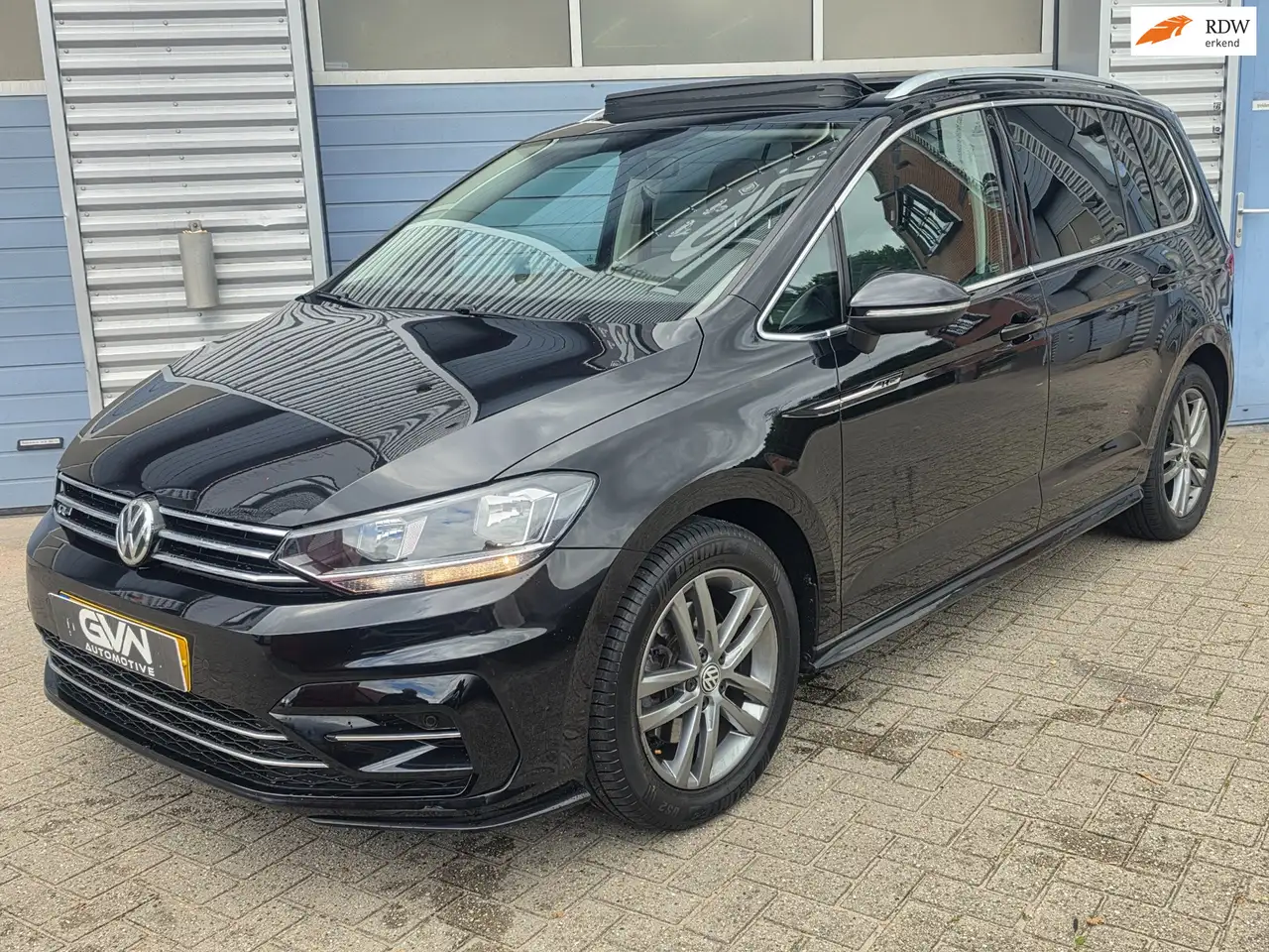 Volkswagen Touran 1.4 TSI Highline Business R 7p — photo 1 of 27