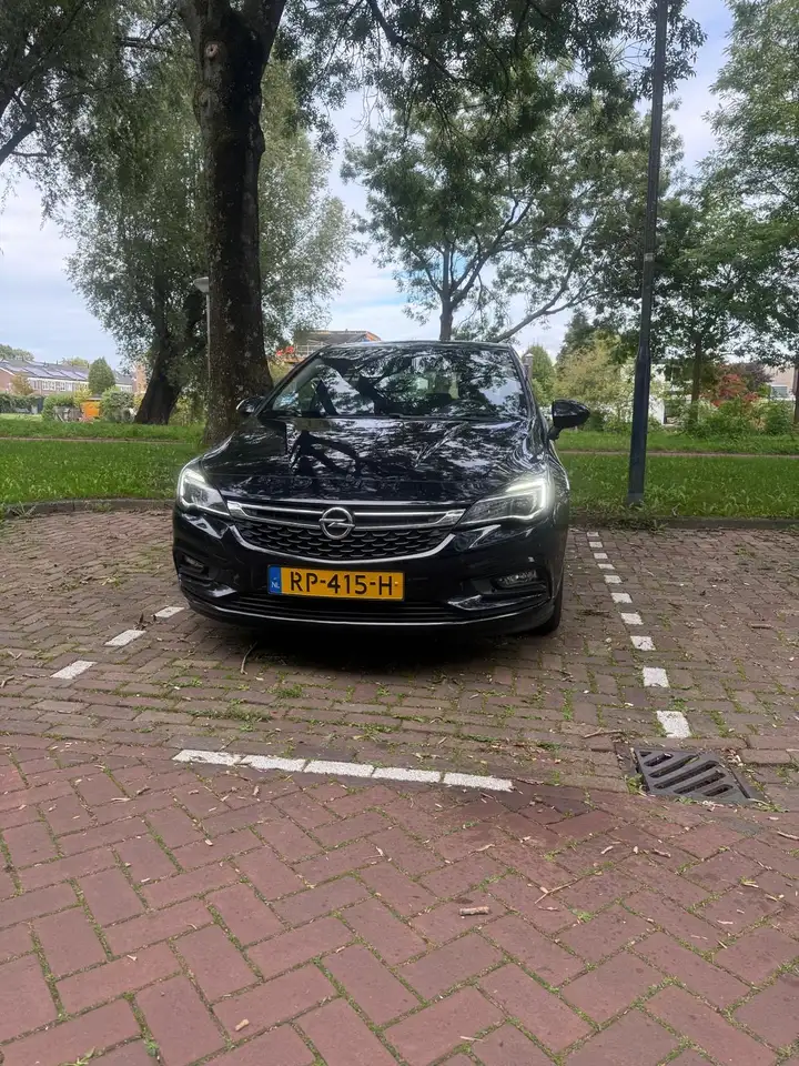 Opel Astra 1.0 Business+ — photo 1 of 11