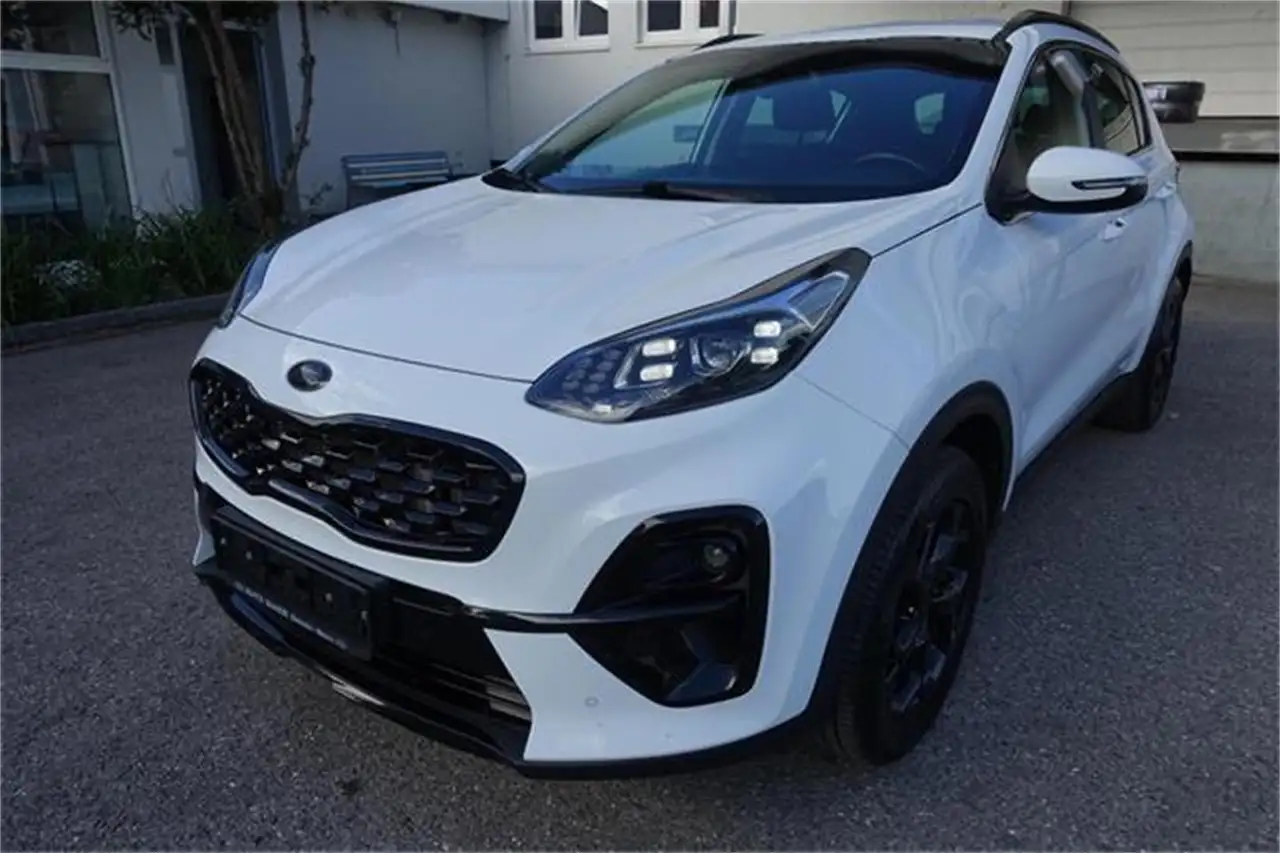 Kia Sportage 1,6 CRDI SCR Black Edition — photo 1 of 11