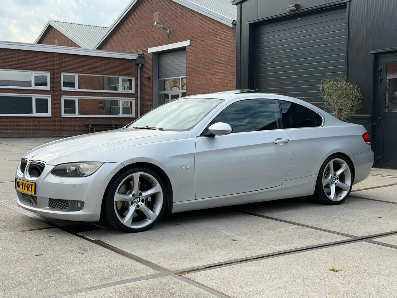 BMW 335 3-serie Coupé 335i Schuifdak Navi Leer NAP — photo 1 of 31