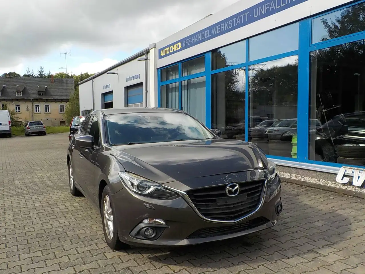Mazda 3 Center-Line — photo 1 of 15