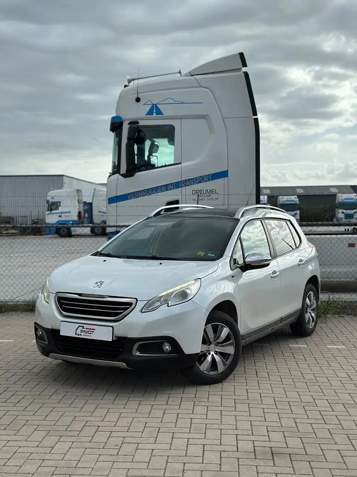 Peugeot 2008 1.2 PureTech Style PANO - NWE APK - AIRCO — photo 1 of 13