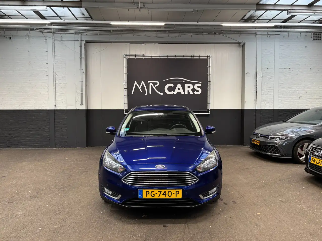 Ford Focus Wagon 1.0 Titanium Edition Navi/Parkeerhulp/Cruise — photo 1 of 17