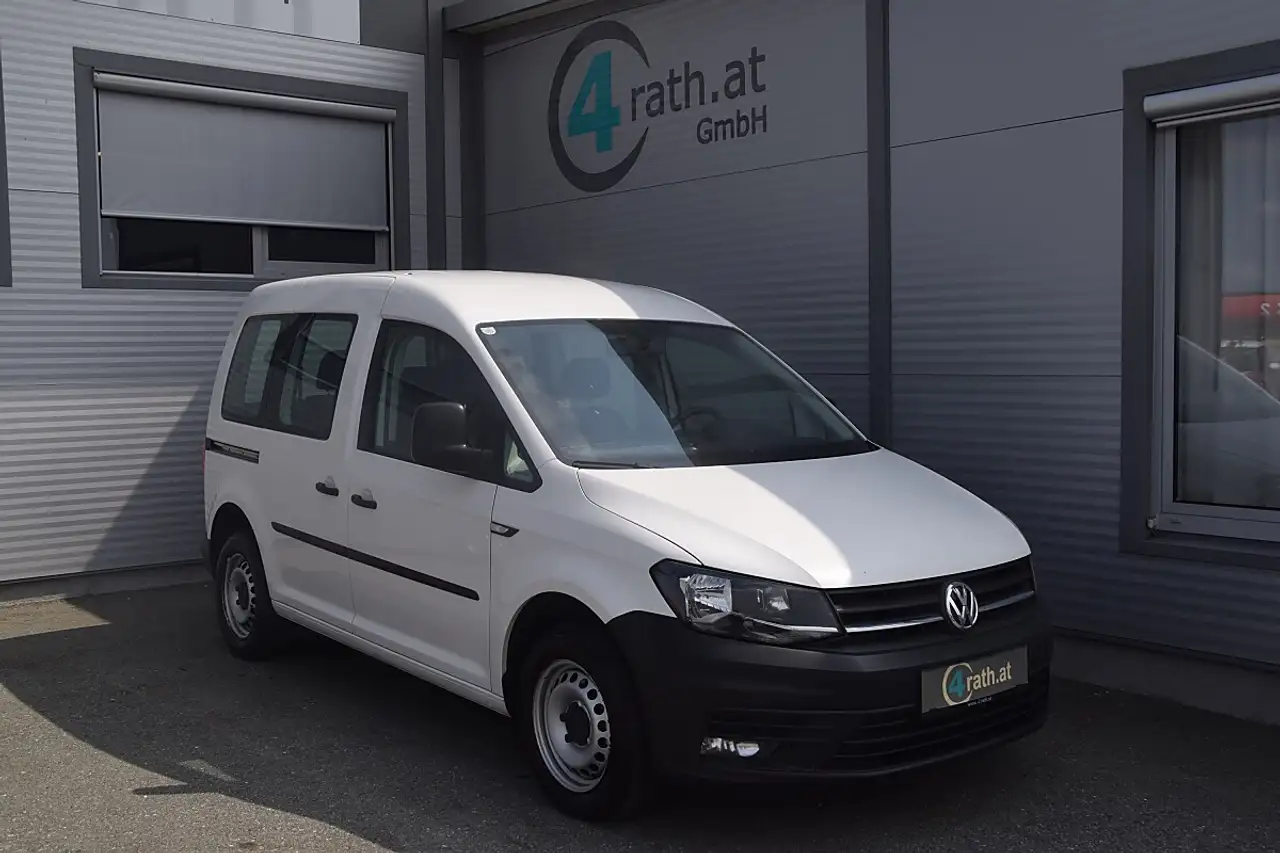 Volkswagen Caddy Kombi 2,0 TDI NAVI / NETTO: 13.316 € — photo 1 of 20