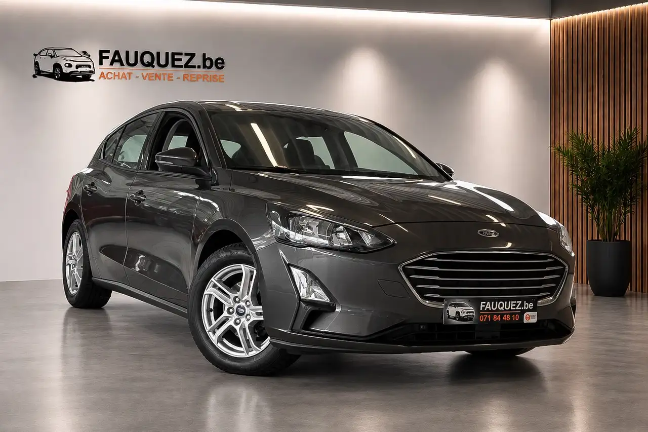 Ford Focus 1.0 EcoBoost | Climatisation - Aide au stationnement - GPS - JA 16’’ | Garantie 12 mois — photo 1 of 15
