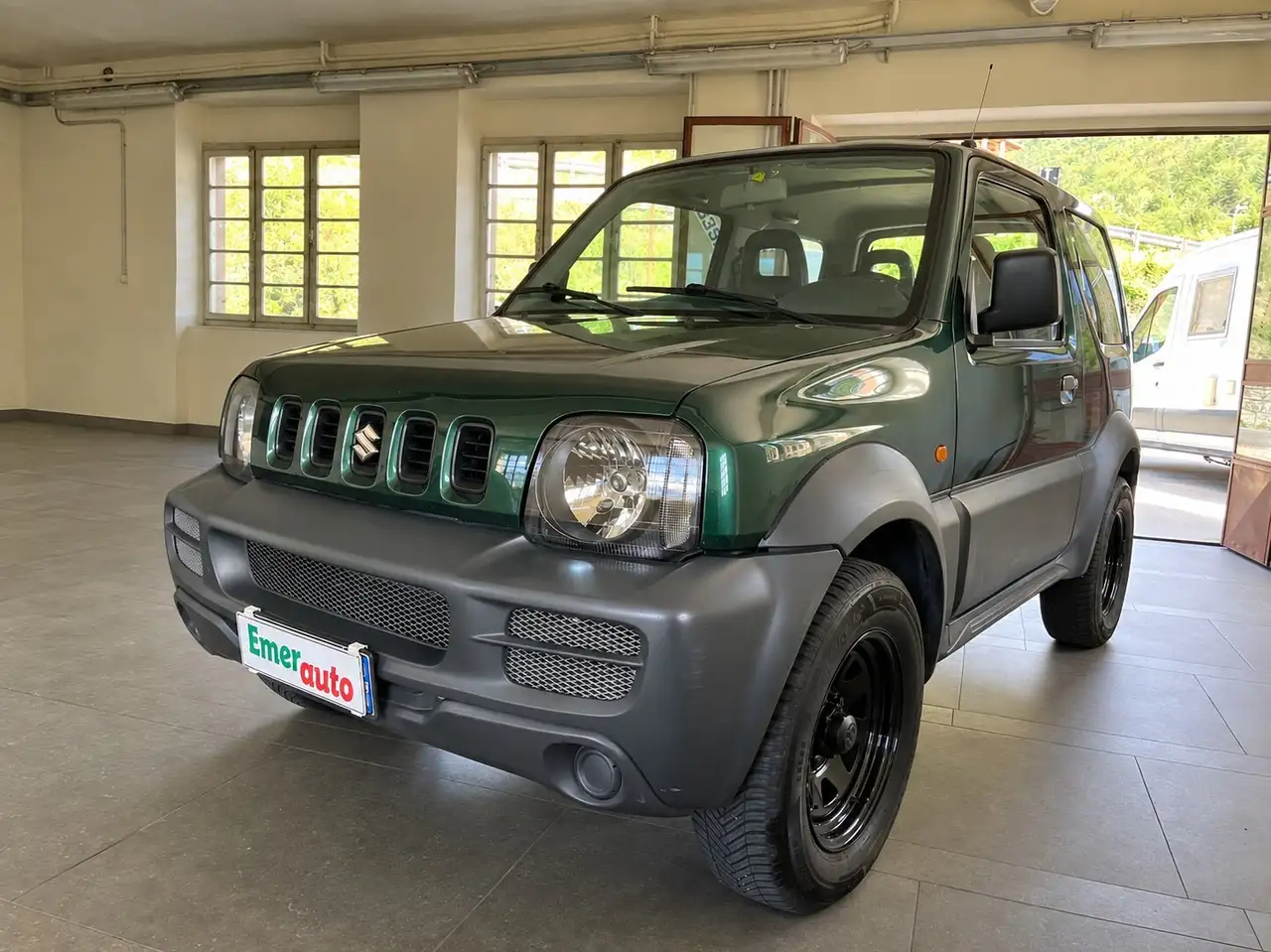 Suzuki Jimny Jimny 1.3i 16V cat 4WD JLX — photo 1 of 14