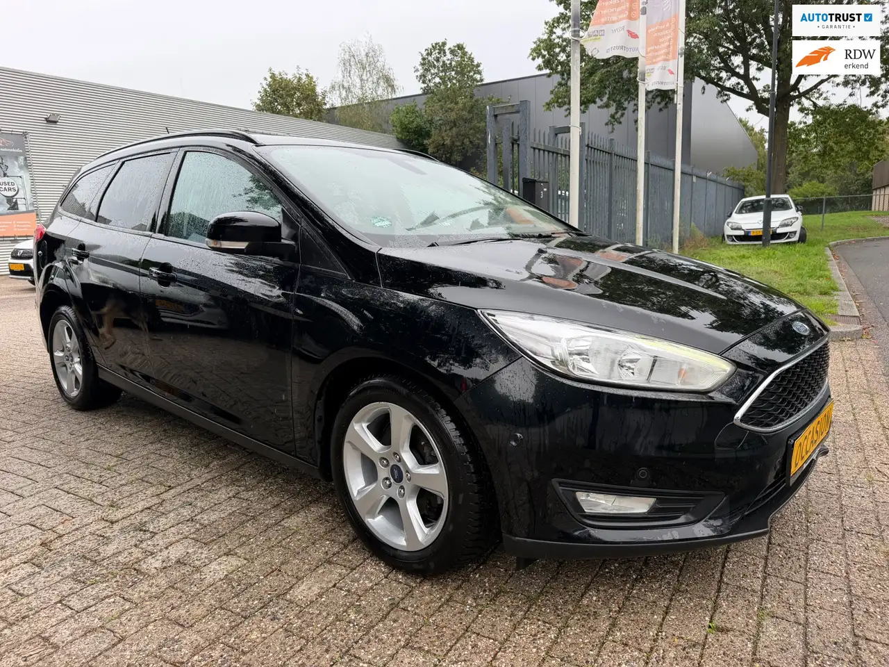 Ford Focus Wagon 1.0 EcoBoost Titanium Business 1e eigenaar, — photo 1 of 40