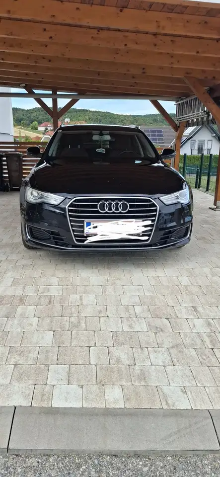 Audi A6 Avant 2,0 TDI ultra S-tronic — photo 1 of 20