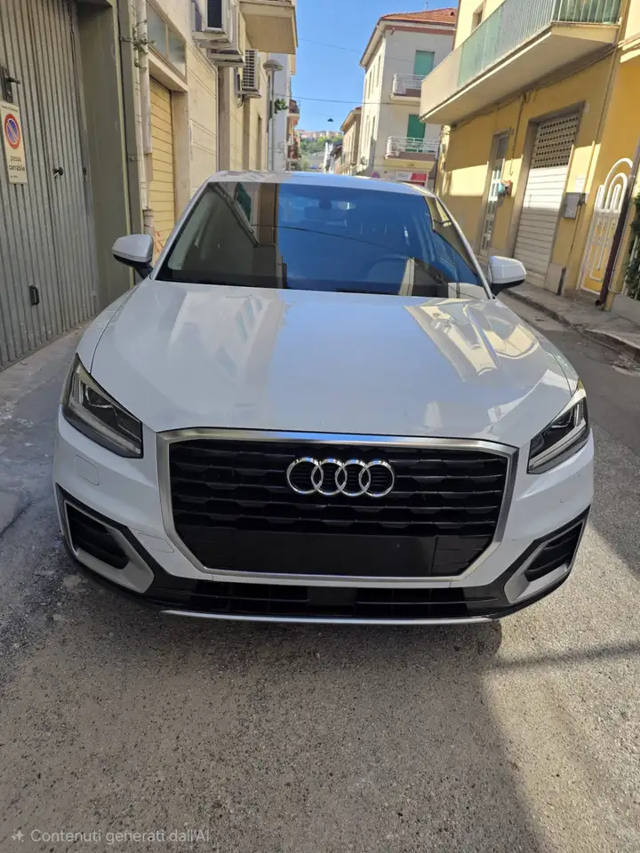 Audi Q2 1.6 tdi S line edition s-tronic — photo 1 of 8