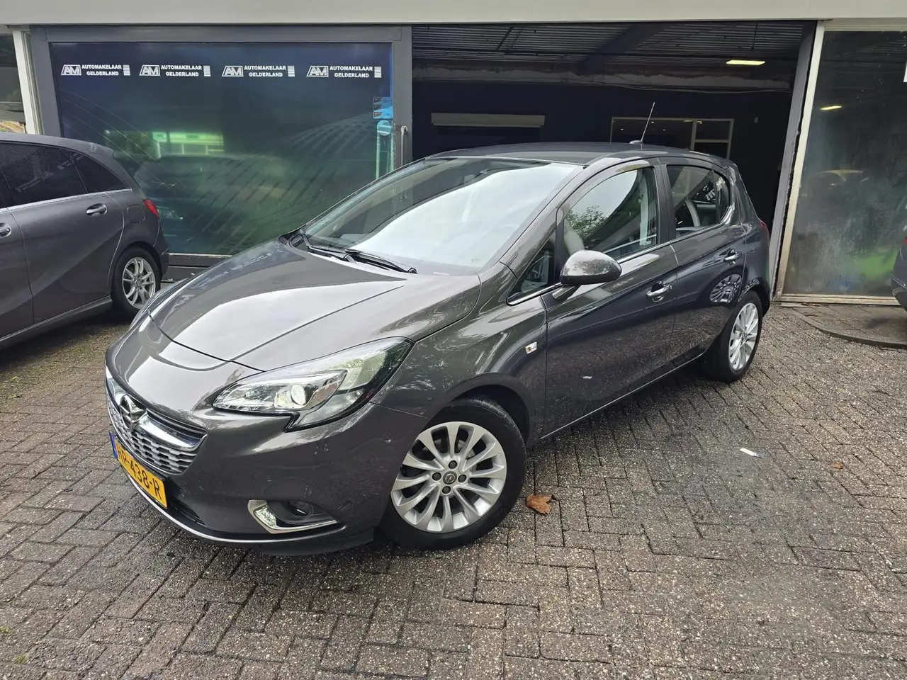 Opel Corsa 1.4 Cosmo | AUTOMAAT | 1E EIGENAAR |3/6 OF 12MND G — photo 1 of 40