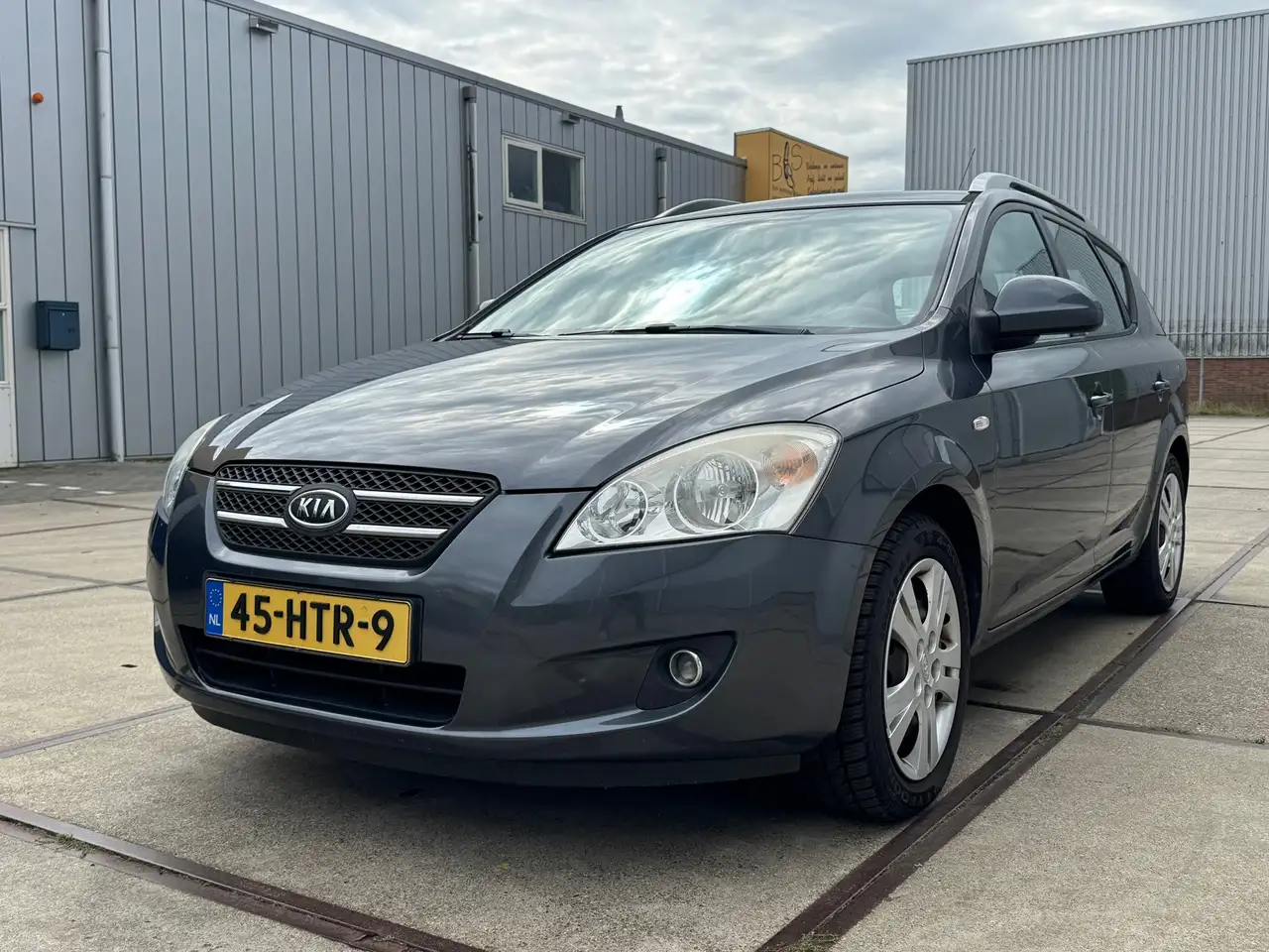 Kia Ceed / cee'd Sporty Wagon 1.4 X-ecutive ISG — photo 1 of 21