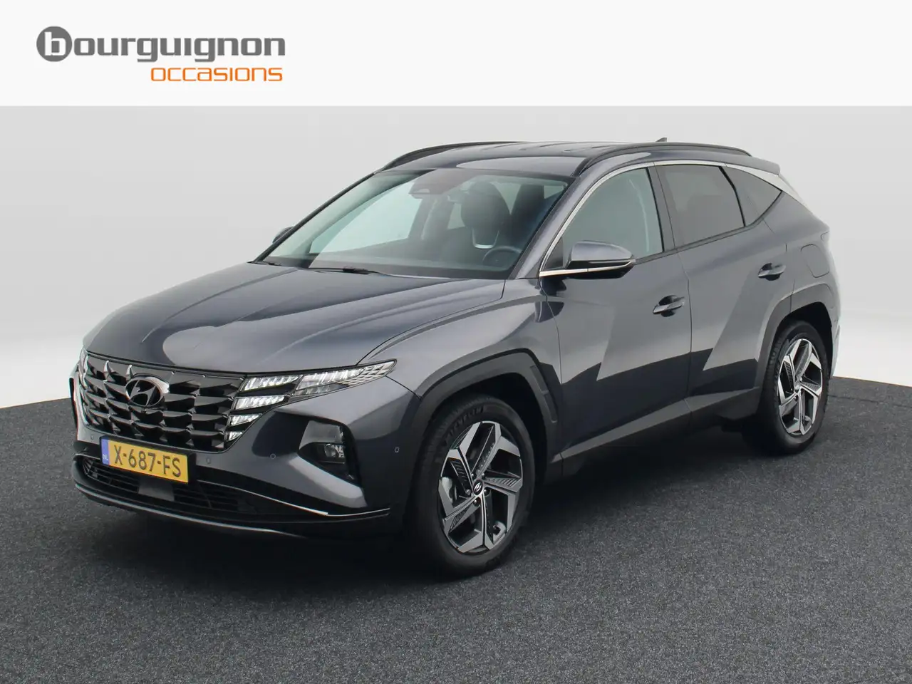 Hyundai TUCSON 1.6 T-GDi 230 Pk HEV Premium | Trekhaak | 19 Inch — photo 1 of 40