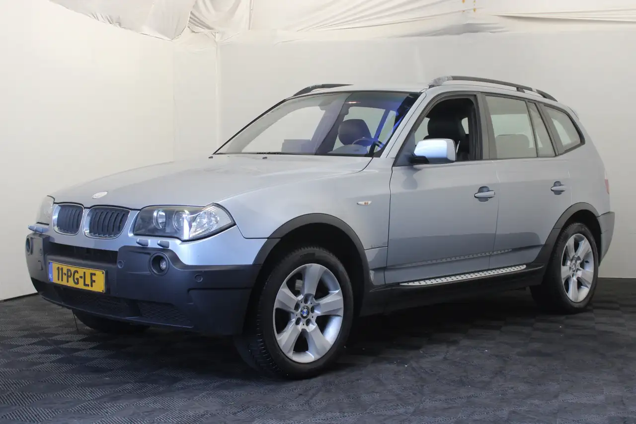BMW X3 3.0d Executive — photo 1 of 17