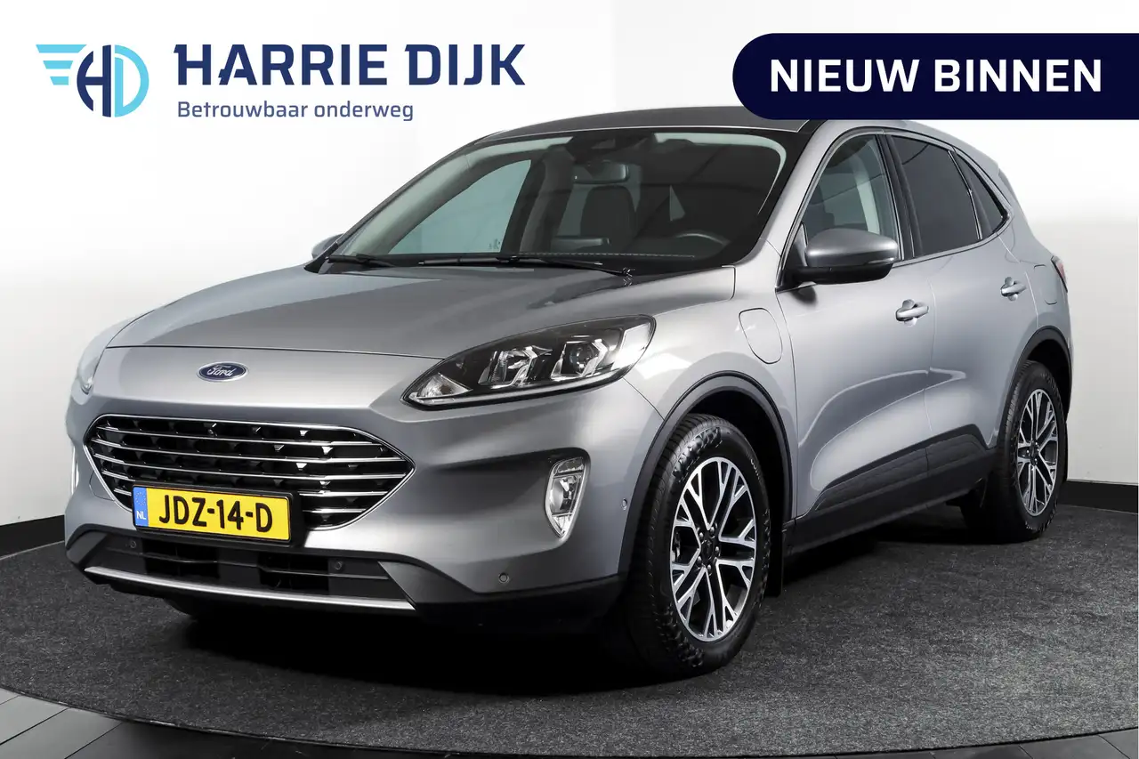 Ford Kuga 2.5 PHEV Titanium | Winterpakket | PDC V+A | Camer — photo 1 of 40