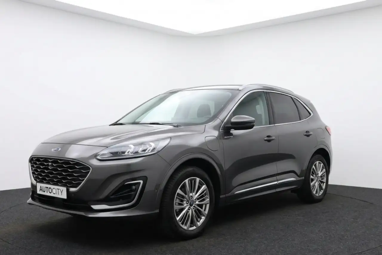 Ford Kuga 2.5 PHEV Vignale Pano l Leder l HUD l WINTERPAKKET — photo 1 of 33